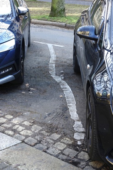 Parking line displaced by heat in summer, Germany