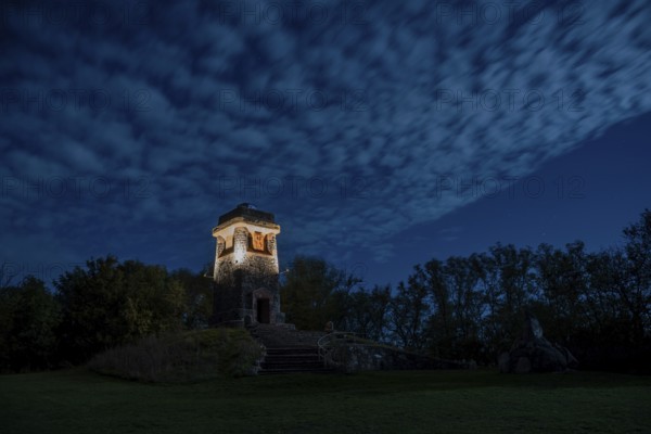 Illuminated Bismarck Tower, Großer Wartberg, cloudy sky, Niederndodeleben, Hohe Börde, Saxony-Anhalt, Germany