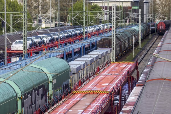 Sindelfingen railway station. Goods trains parked on the tracks. Automotive RailNet. Car transport by train, new Mercedes cars. Baden-Württemberg, Germany