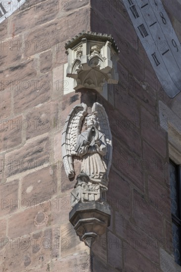 Angel figure, a house figure on the medieval residential tower, the Nassauer Haus, Lorenz Platz, Nuremberg, Middle Franconia, Bavaria, Germany