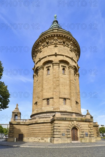 Mannheim, Germany, August 2022: Water Tower called 'Wasserturm', a landmark of German city Mannheim in small public park on sunny day