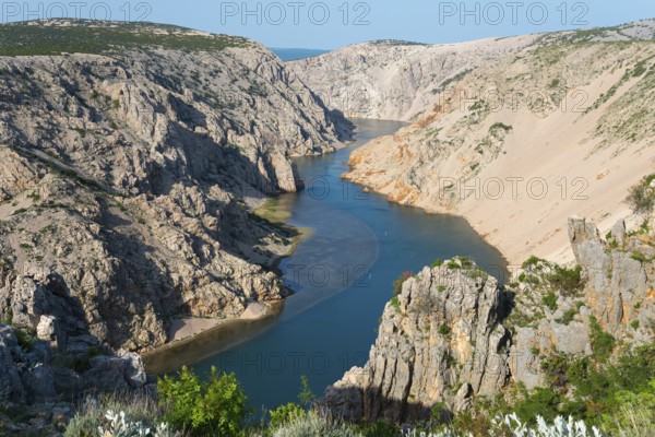 A river flows through a deep, rocky gorge with steep cliffs and clear watercourses, Pariževacka Glavica, Parizevacka, location of Karl May films, Zrmanja River, Jasenice, Zadar County, Croatia