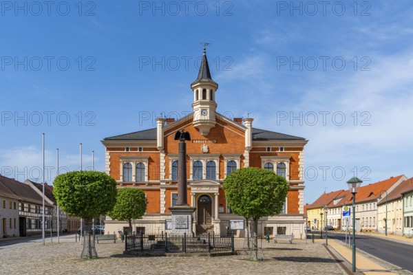 Brick façade on the town hall of Liebenwalde and war memorial, Oberhavel, Brandenburg, Germany