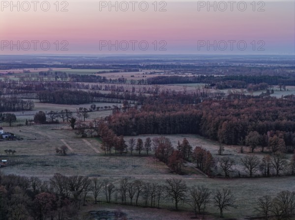 Landscape in the Drömling UNESCO Biosphere Reserve in the Altmark at dawn on a cold spring day. aerial view. Dannenfeld, Gardelegen, Saxony-Anhalt, Germany