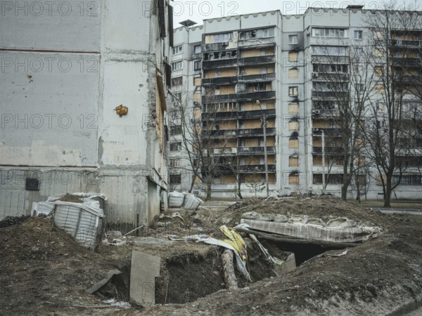 Trench and destroyed residential building in Saltivka, Kharkiv, Ukraine