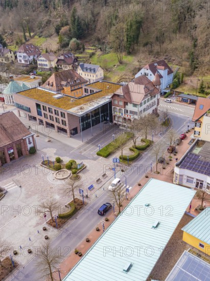 Buildings and streets of a small town surrounded by trees, pastel-coloured architecture and rural atmosphere, Bad Liebenzell, district of Calw, Germany