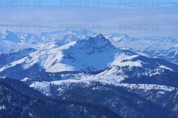 Mountains with snow-covered peak, panorama under biphasic sky, KItzbühlerhorn, Tyrol, Austria