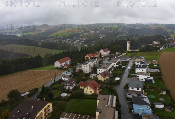 Drone image, residential buildings, view of village with church, Brunnenthal, Innviertel, Upper Austria, Austria