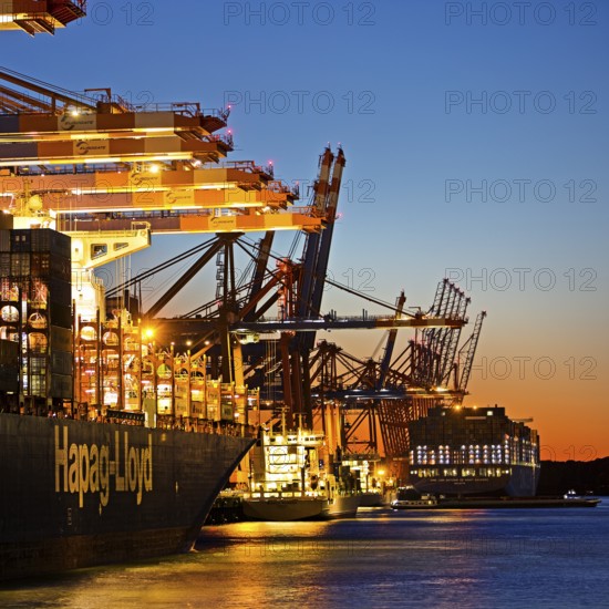 Container ships at the Eurogate container terminal in the evening with an atmospheric sunset, harbour, Hamburg, Germany