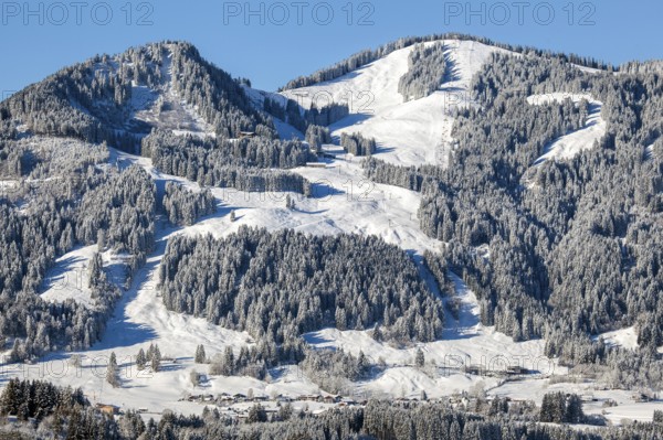 Snow-covered winter landscape, view of Bolsterlang and Bolsterlanger Horn with skiing area, Illertal, Oberallgäu, Allgäu, Bavaria, Germany