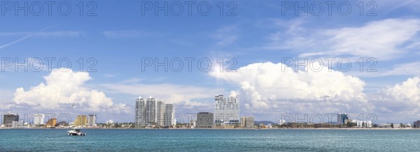 View from Deer Island, Isla de Venados, of famous Mazatlan sea promenade El Malecon, with ocean lookouts, luxury hotels, beaches and scenic landscapes