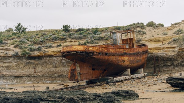 Abandoned supply boat, abandoned Swift factory, The Swift refrigerator in Puerto San Julián, Puerto San Julián, Santa Cruz Province, Argentina