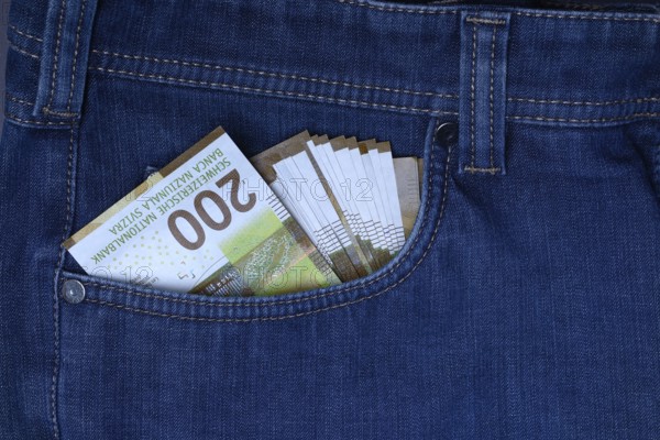 Banknotes in trouser pocket, Swiss franc, Switzerland