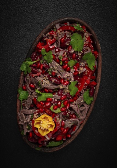 Georgian salad Tbilisi, boiled beef, with red beans and onions, sweet pepper, walnut and pomegranate, homemade, no people