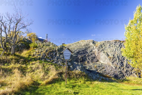 Exposed basalt columns from volcanic times, here the so-called giant staircase with information sign, Hirtstein, Marienberg, Erzgebirge, Saxony, Germany
