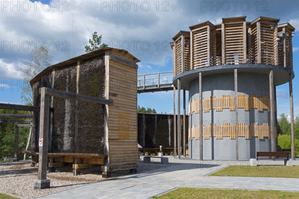 Modern wooden construction with round tower and evaporating walls, clear blue sky with clouds, brine, graduation tower, observation tower, spa town Milomlyn, Milomlyn, Lviv, Warmia-Mazury, Poland