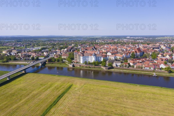 Aerial view with Elbe, Elbe bridge, Hartenfels castle and old town, Torgau, Saxony, Germany