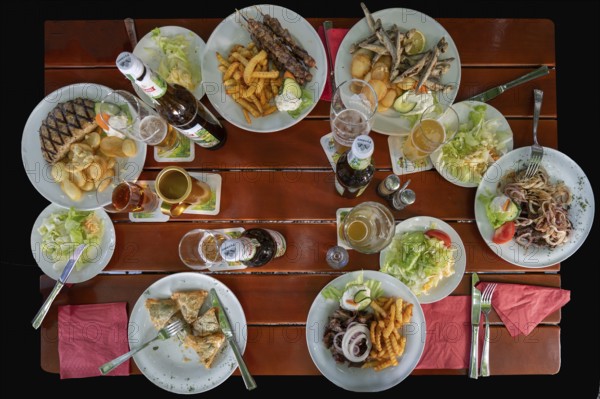 Greek food on a garden table, Franconia, Bavaria, Germany