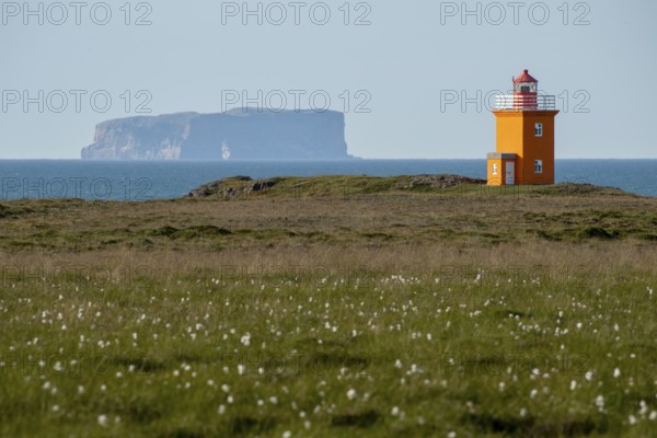 Lighthouse Hegranesviti, Hegranes, peninsula Landsendi, in the background island Drangey, near Sauðárkrokur, Skagafjörður, Iceland