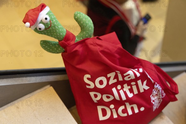 Berlin, Germany - 30 November 2024: A bag with the words Soziale Politik für Dich (Social Policy for You) on it lies on a staircase in the Willy Brandt House during the so-called election victory conference at the start of the Bundestag election campaign