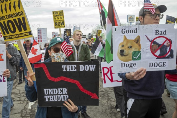 Detroit, Michigan - Labor organizations protest President Trump's 'war on working people' with a march and rally on May Day, the traditional International Workers Day