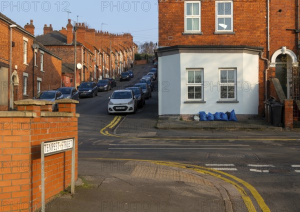 Victorian terraced housing with no front gardens, Bernard Street from Tempest Street, inner city of Lincoln, Lincolnshire, England, UK