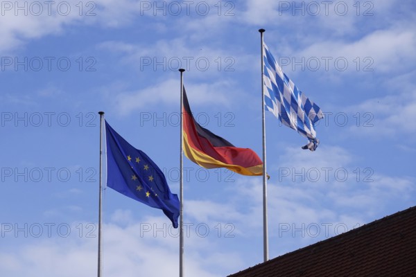 Flags blowing in the wind: Europe, Germany, Bavaria