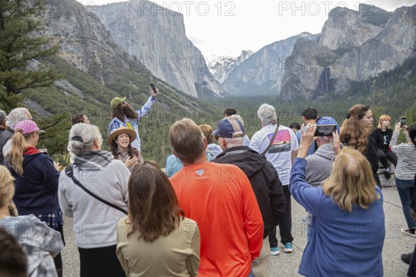 Yosemite National Park, California - A park ranger talks to tourists at the western entrance to Yosemite Valley in Yosemite National Park