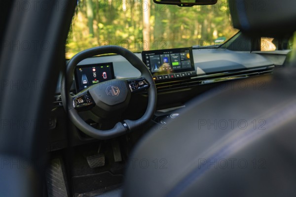 Modern car interior with digital dashboard and touchscreen in the forest, Deer E- Carsharing, Calw, Black Forest, Germany