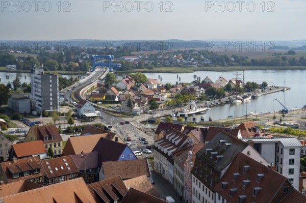 Town view with castle island, Peene river and Peene bridge, view from the tower of St Peter's church, Wolgast, Usedom island, Mecklenburg-Western Pomerania, Germany