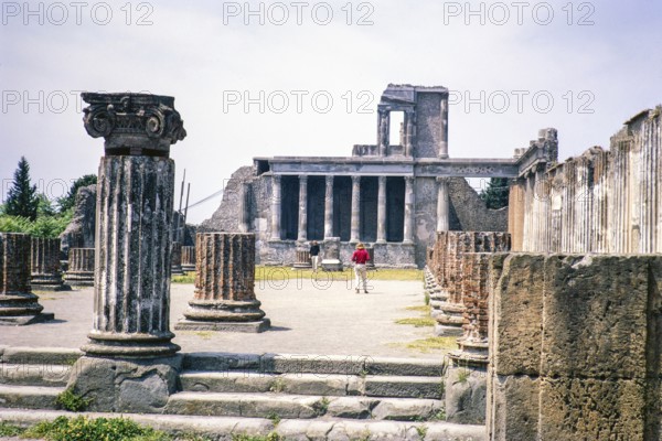 Tourists visit the Roman ruins Archaeological Park of Pompeii, Naples, Italy, Europe 1967
