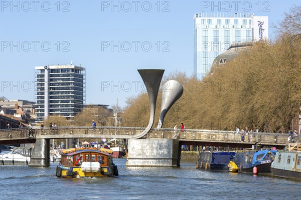 Waterbus ferry boat approaching city centre, Pero's Bridge footbridge, Floating Harbour, Bristol, England, UK