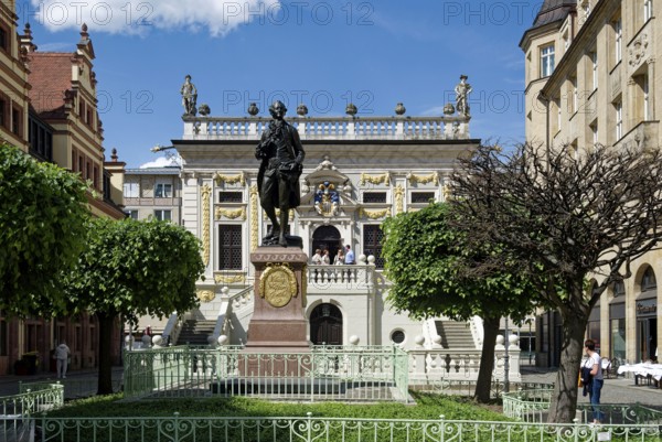 Baroque Old Trade Exchange, bronze statue of Goethe by Carl Seffner, depicting Johann Wolfgang von Goethe, and Old Town Hall at the Naschmarkt, Leipzig, Saxony, Germany
