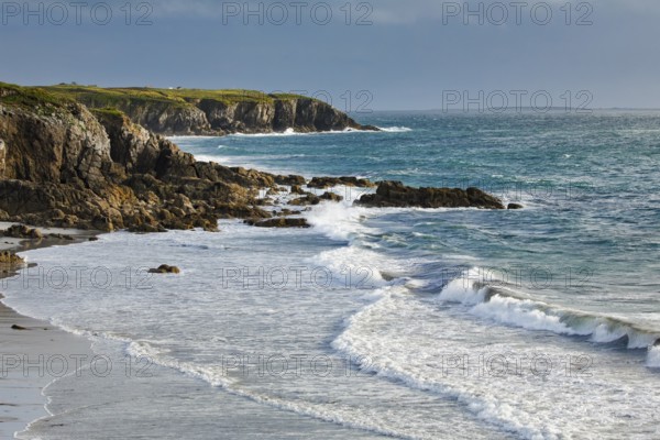 Waves breaking on the rocky coast near Plouarzel on the Atlantic coast, Département Finistère, Brittany, France