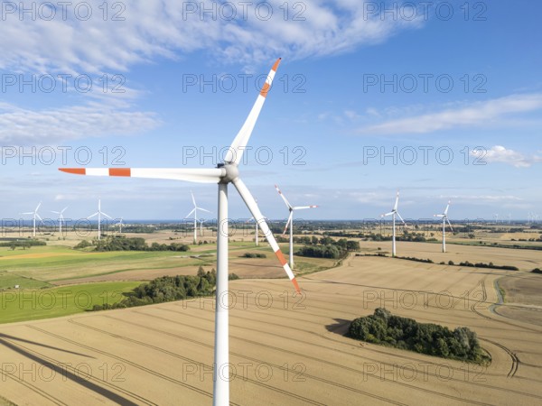 Wind turbine in a wind farm renewable energy wind power wind energy on the Baltic Sea aerial view near Heiligenhafen, Germany