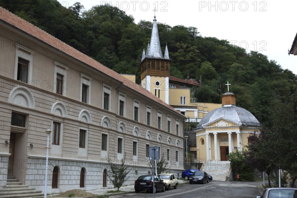 Banat, spa, Hercules bath, Baile Herculane, houses and church in the old town centre, Romania