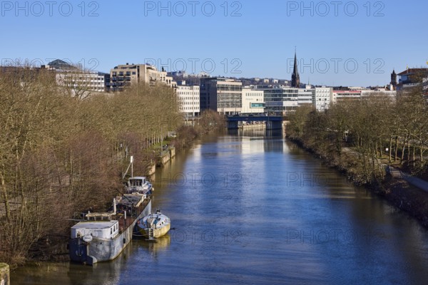 River Saar, riverbank, footpath and cycle path, ship, bare trees, general architecture, car and pedestrian bridge, long shot, bird's eye view, blue sky, cloudless, Luisenbrücke, Saarbrücken, state capital, regional association Saarbrücken, Saarland, Germany