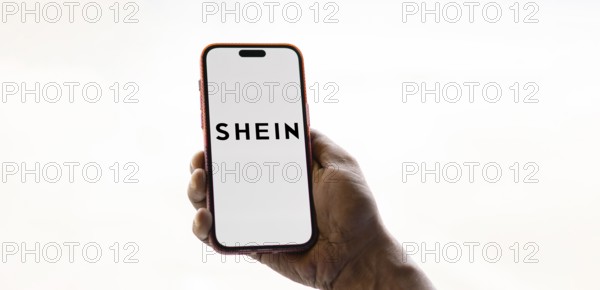 Dhaka, bangladesh- 26 Nov 2024: Shein logo is displayed on smartphone.Shein is a fast fashion retailer company