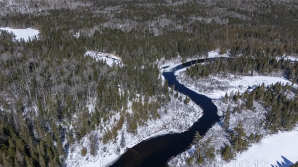 Wolf river. unfrozen part of the river in winter. Mastigouche wildlife reserve.. Province of Quebec. Canada
