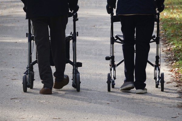Symbolic image, senior citizens going for a walk on a rollator, autumn, Saxony, Germany