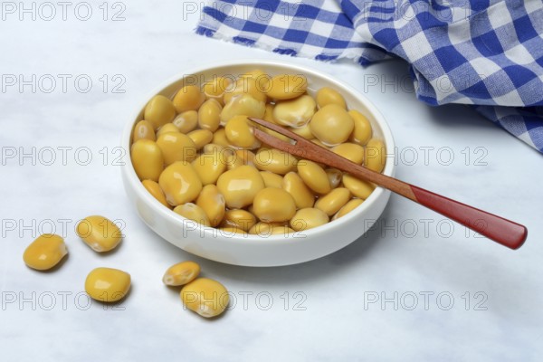 Lupine (Lupinus), pickled lupine seed in small bowls