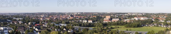 Panorama of the city view from the north-east with district administration office, Jakobikirche, Donatsturm, Nikolaikirche, cathedral, Petrikirche and building of the TU Bergakademie, Freiberg, Saxony, Germany