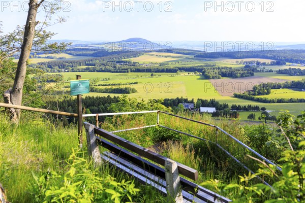 Viewpoint Schneiderfelsen with bench and view of the Pöhlberg, Erzgebirge, Saxony, Germany