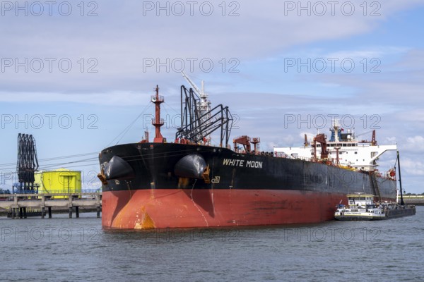 Large tanker White Moon being unloaded, for crude oil, in the petroleum harbour, seaport of Rotterdam, Maasvlakte, Rotterdam Netherlands