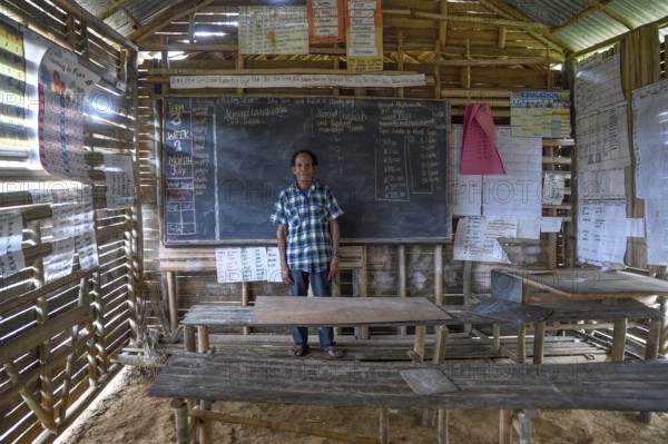 Local teacher in a school in the village of Upovia, Lake Murray, Western Province, Papua New Guinea