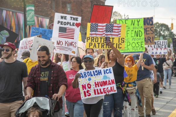 Detroit, Michigan USA - 18 October 2025 - A large crowd gathered for a 'No Kings' rally, protesting President Trump's actions against immigrants and against democratic institutions