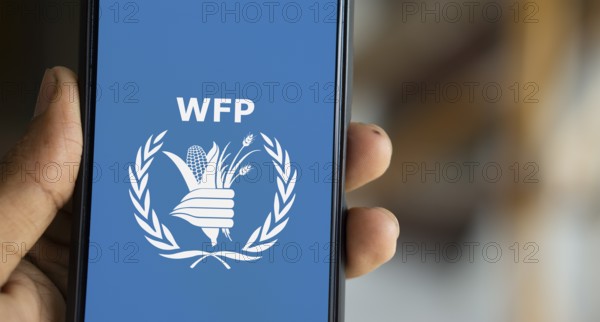 World Food Programme (WFP) logo is displayed on smartphone.