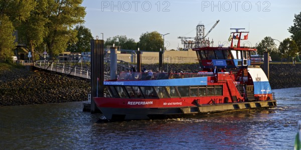 Harbour ferry MS Reeperbahn from HADAG's 2000 series at the Bubendey-Ufer ferry terminal in the Port of Hamburg, Germany