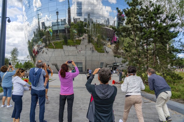 The Boijmans Van Beuningen depot in Rotterdam, show depot of the Boijmans Van Beuningen art museum, over 15, 000 exhibits that are not on display in the museum are presented here, exterior façade with 1664 curved reflective glass panes, birch forest on the roof, Netherlands