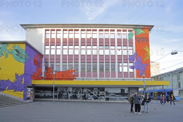 Mural by KolorCubes for documenta fifteen, 15, street art, graffiti, pedestrian, pedestrian zone, Ruruhaus, tram, Obere Königsstraße, Treppenstraße, Kassel, Hesse, Germany